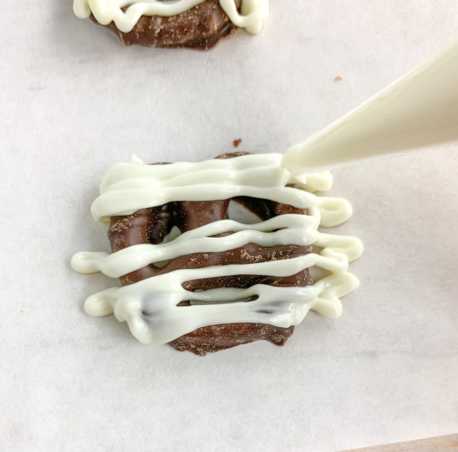How to make the chocolate covered pretzel mummies for your Halloween Snack Mix
