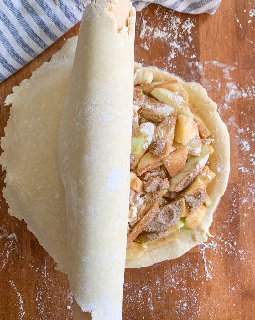 Use your rolling pin to transfer your top crust to the pie