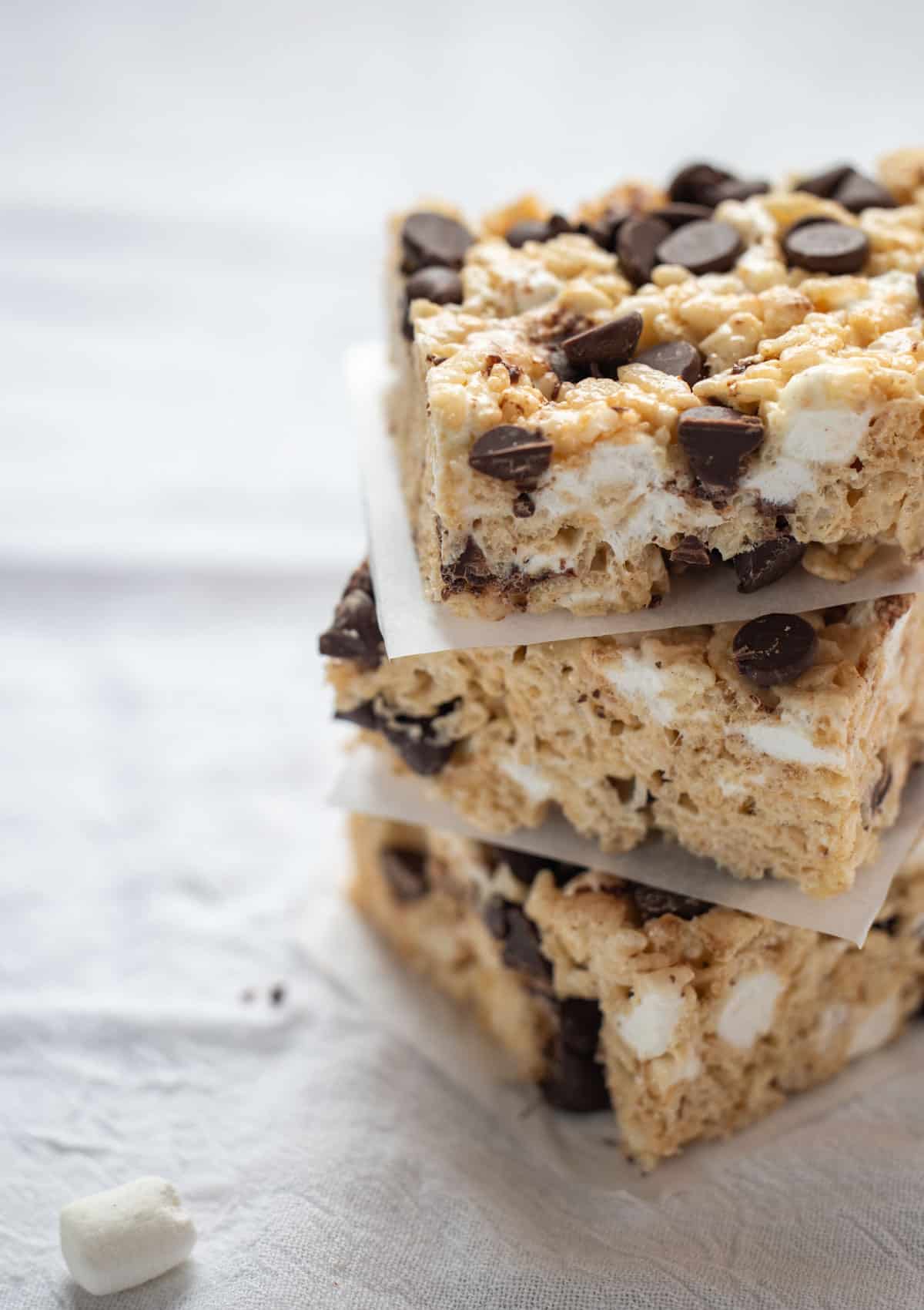 A Stack of Rice Krispie treats with chocolate chips