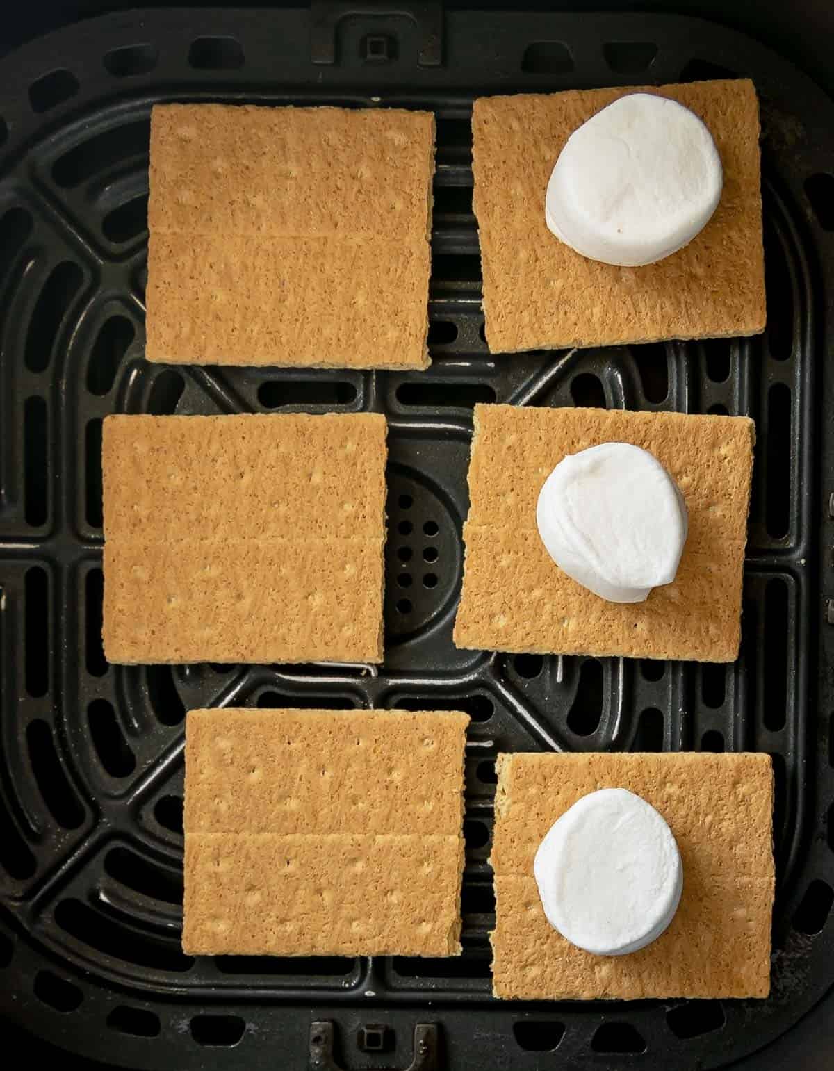 Marshmallows and graham crackers in the air fryer basket