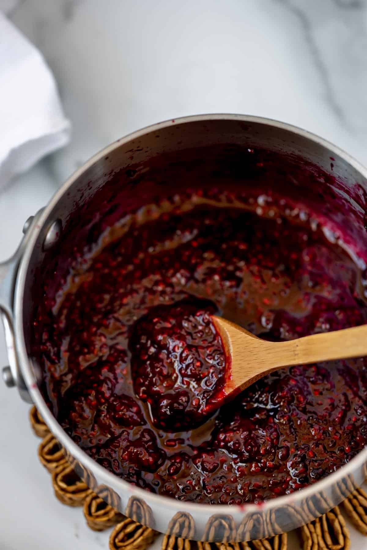 Jam simmered and mashed until smooth in a sauce pan